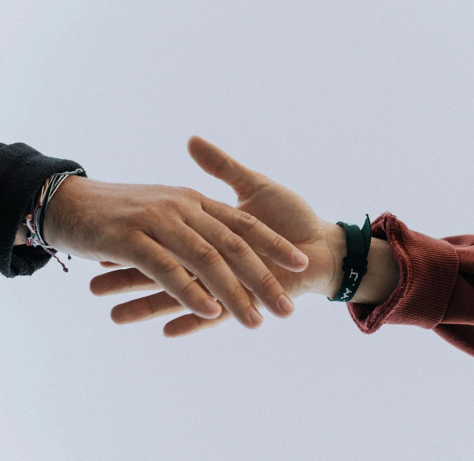 view of two persons hands